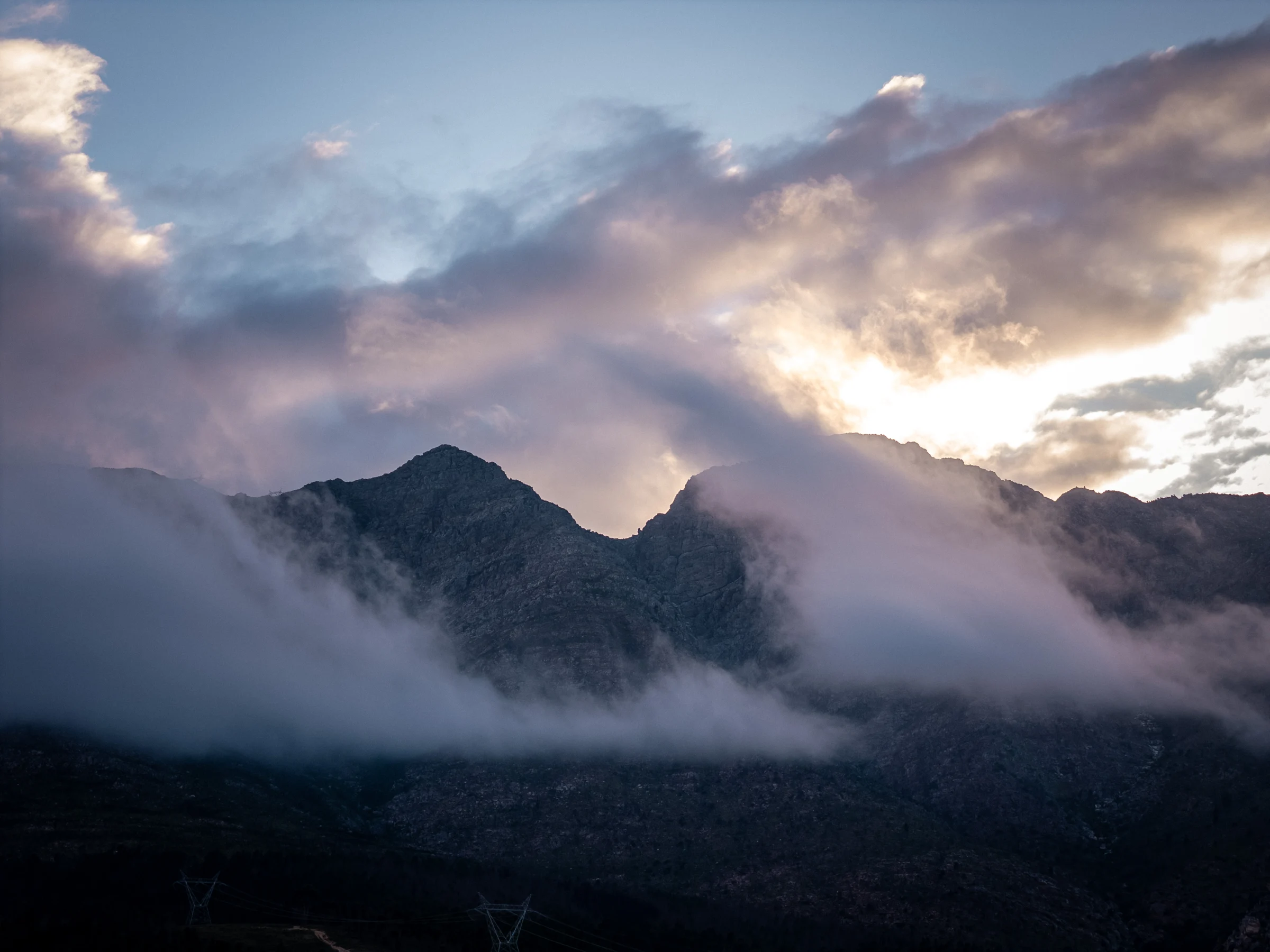 Clouds drifting over the Tulbagh mountains at sunset